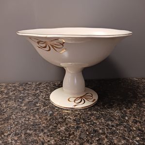 Vintage teleflora pedestal candy dish. Ivory with gold trim. Great holiday decor